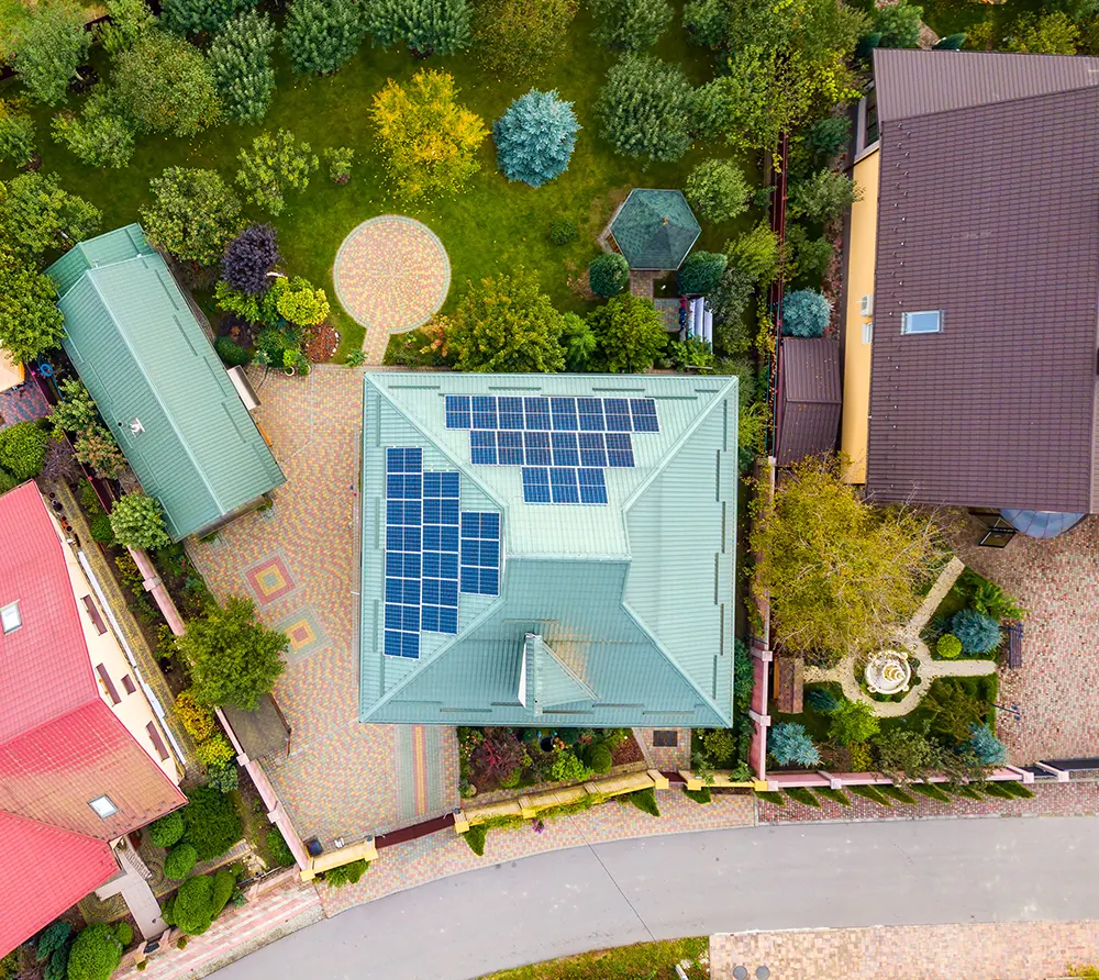 aerial view of a rural private house with solar ph